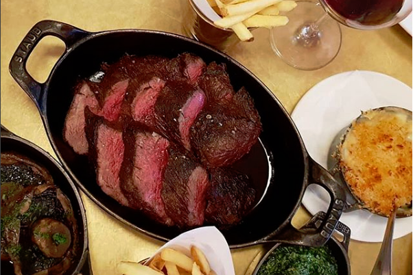 Steak and chips with a glass of Oloroso