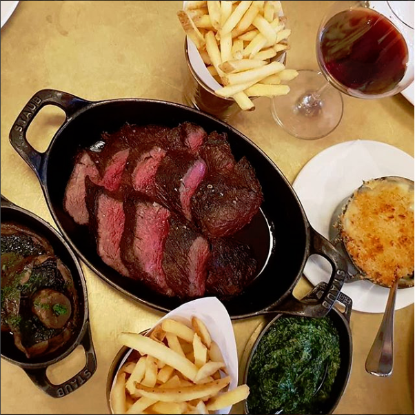 Steak and chips with a glass of Oloroso