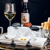 Manzanilla paired with their Tsar Nichoulai Caviar Service with brioche, quail egg, chives, and creme fraiche
